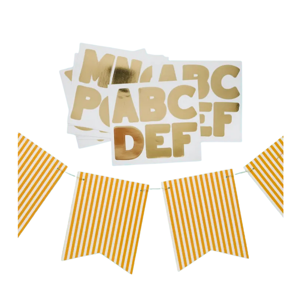 Yellow striped banner and gold alphabet sticker set for birthday from Parte Haus party supply store in Bethesda MD