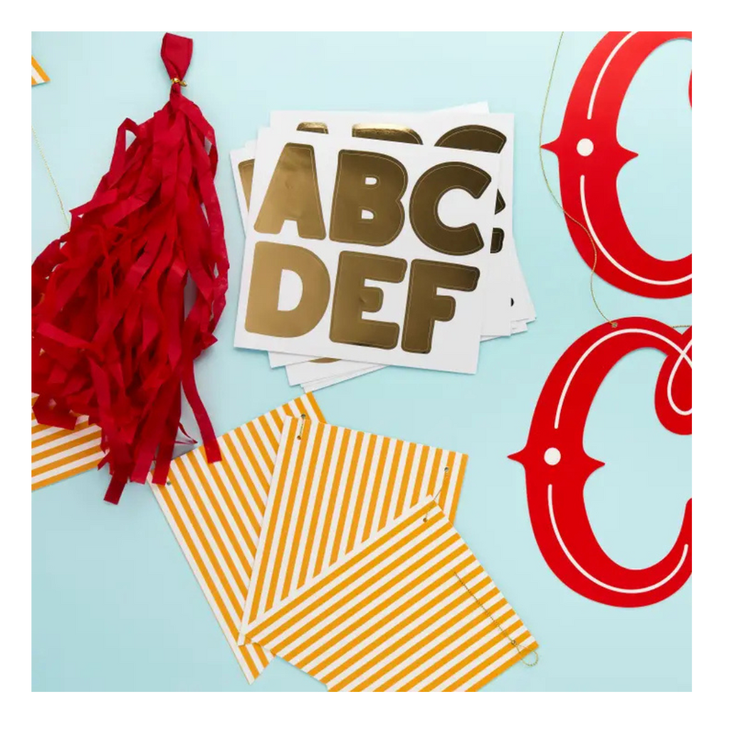 Red yellow and gold letter banner kit with red tassel for celebration from Parte Haus party supply store in Bethesda MD