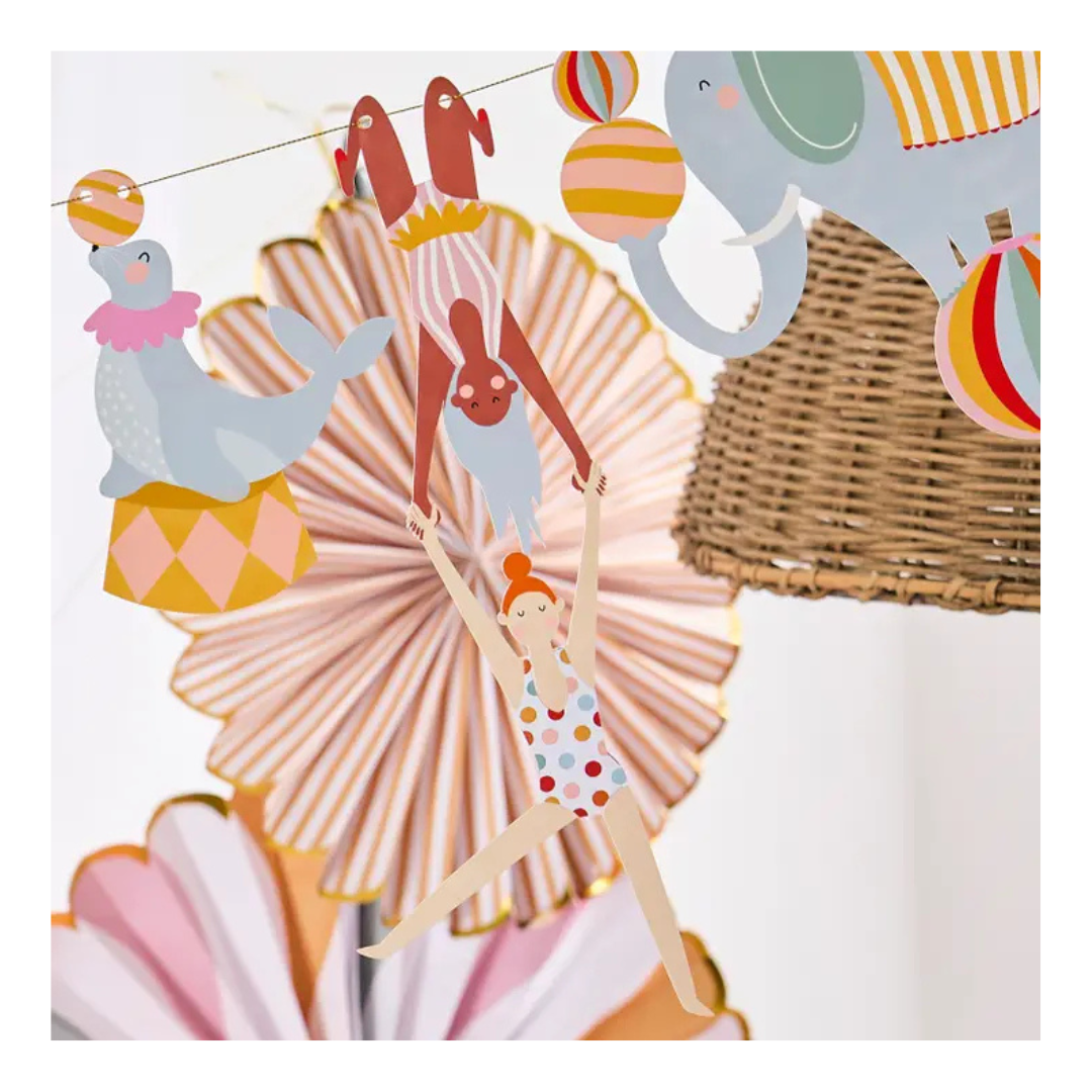 colorful circus garland with acrobats seal and elephant for birthday from Parte Haus party supply store in Bethesda Maryland