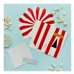 Red and white circus popcorn box flat packs with popcorn and lollipop for circus party from Parte Haus party supply store in Bethesda MD