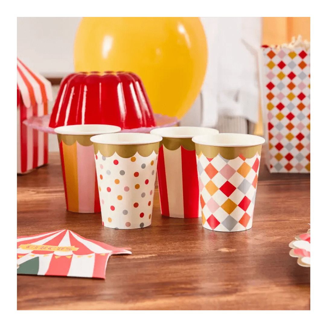 Colorful carnival paper cups with gold trim perfect for circus theme from Parte Haus party supply store in Bethesda, Maryland