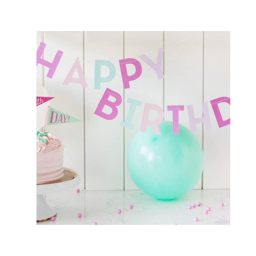 Pink happy birthday banner pastel letters for birthday party from Parte Haus party supply store in Bethesda MD
