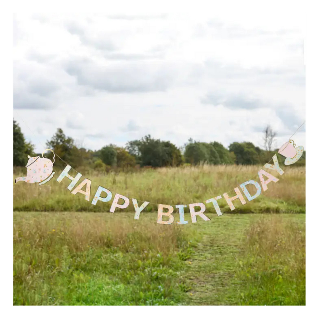 Pastel teapot and teacup birthday banner outdoor tea party decor from Parte Haus party supply store in Bethesda MD