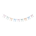 Pastel rainbow bow garland with hanging ribbons for birthday from Parte Haus party supply store in Bethesda MD