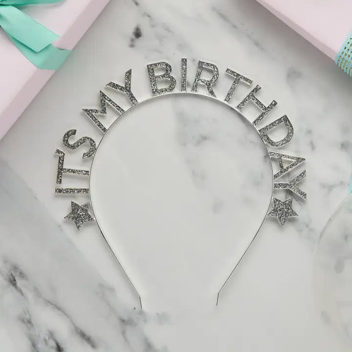 Silver birthday headband with glitter letters and stars for birthday celebration from Parte Haus party supply store in Bethesda MD