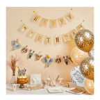 Gold and white animal print birthday decoration set with balloons cake and garlands safari theme from Parte Haus party supply store in Bethesda MD