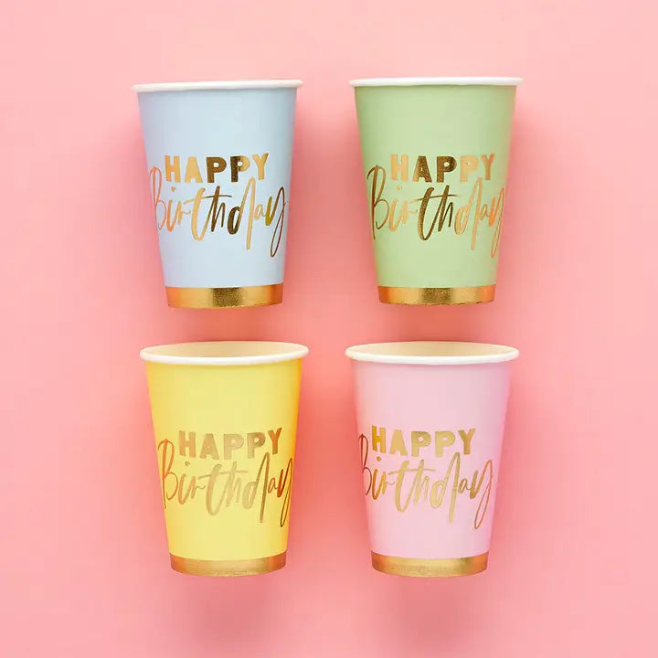 Pastel blue green yellow and pink birthday cups with gold lettering for birthday from Parte Haus party supply store in Bethesda Maryland