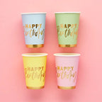 Pastel blue green yellow and pink birthday cups with gold lettering for birthday from Parte Haus party supply store in Bethesda Maryland