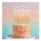 Gold birthday candles tall and elegant on cake for birthday celebration from Parte Haus party supply store in Bethesda MD