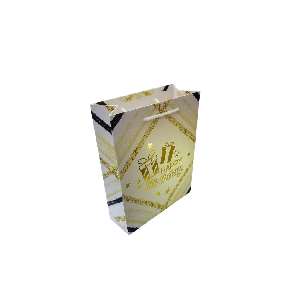 Gold white gift bag with happy birthday text and present design birthday theme from Parte Haus party supply store in Bethesda Maryland