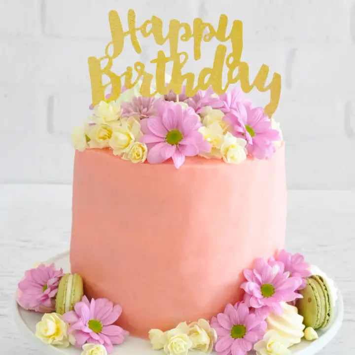 gold glitter cake topper with happy birthday text floral and pastel cake birthday theme from Parte Haus party supply store in Bethesda MD