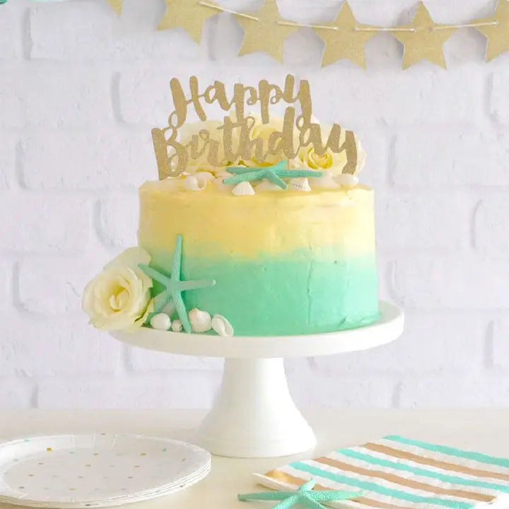 gold happy birthday glitter cake topper with beach theme Parte Haus party supply store in Bethesda Maryland
