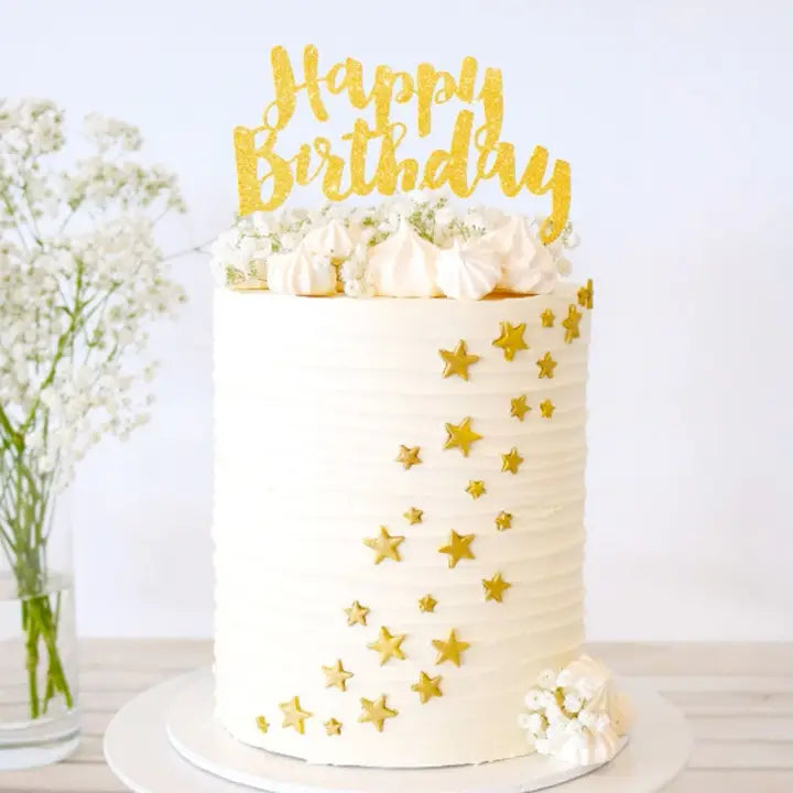 Gold glitter Happy Birthday cake topper with white and gold star cake for birthday from Parte Haus party supply store in Bethesda MD.