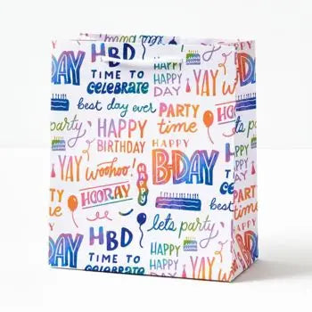 Rainbow Happy Birthday gift bag with colorful hand lettered design birthday theme from Parte Haus party supply store in Bethesda MD