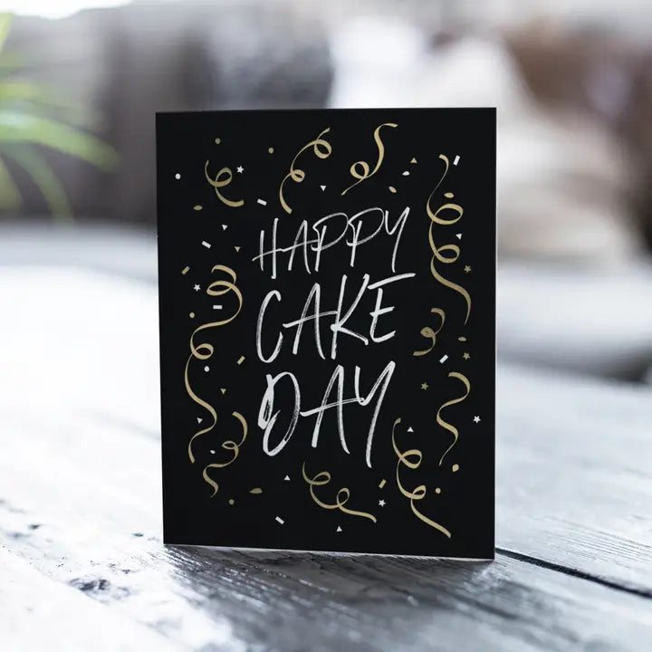 Black and gold birthday greeting card with confetti for birthday theme from Parte Haus party supply store in Bethesda MD.