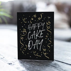 Black and gold birthday greeting card with confetti for birthday theme from Parte Haus party supply store in Bethesda MD.
