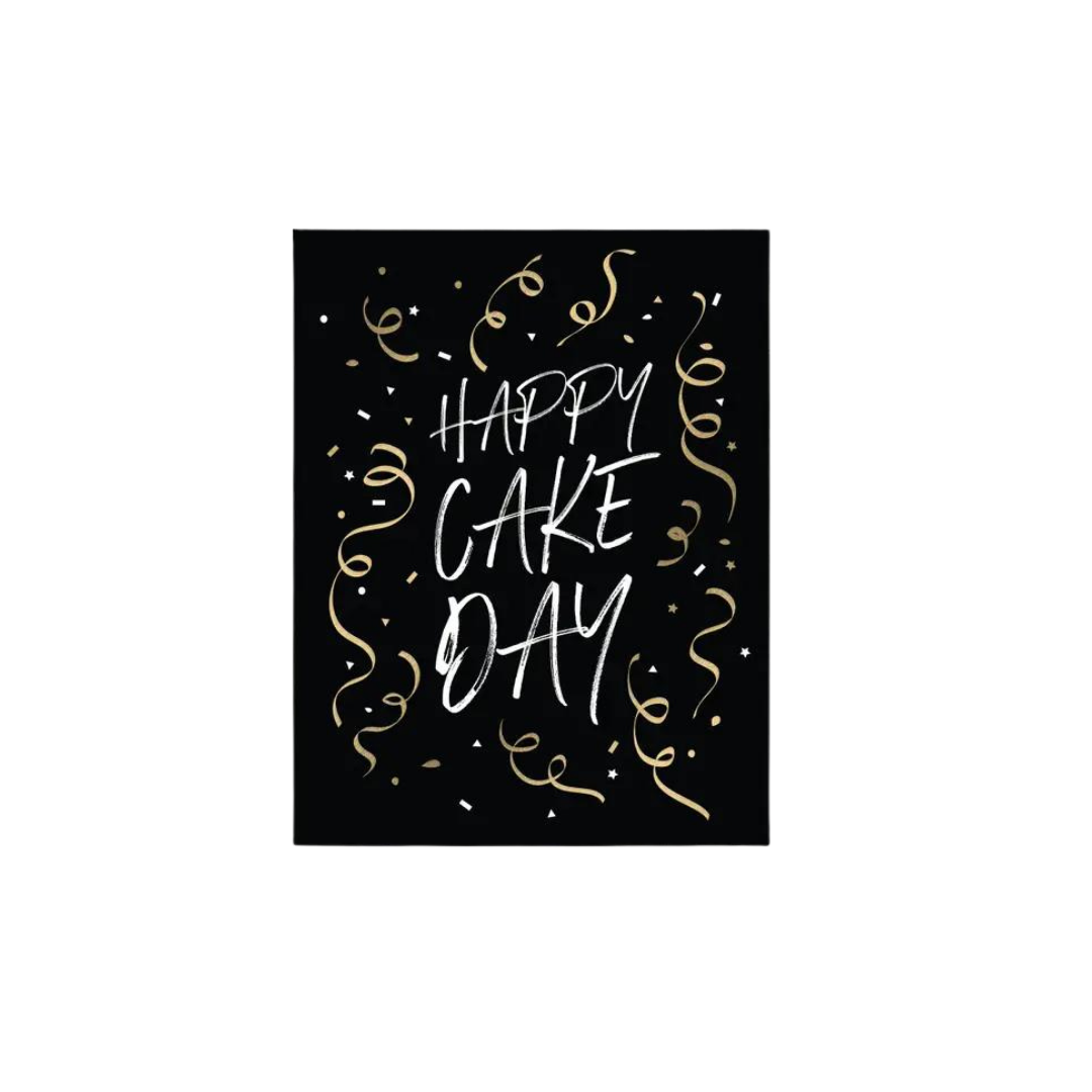 Black and gold birthday greeting card with Happy Cake Day text and festive swirls from Parte Haus party supply store in Bethesda Maryland