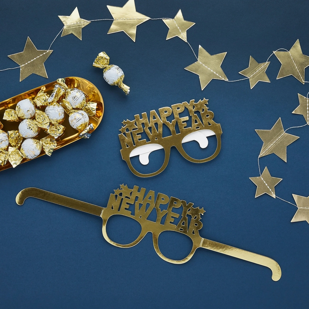 Gold Happy New Year glasses festive novelty eyewear New Year theme from Parte Haus party supply store in Bethesda MD