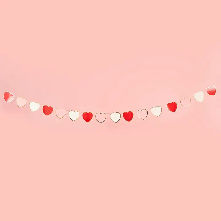 Red and white heart garland with cutout hearts for Valentine's Day from Parte Haus party supply store in Bethesda MD