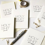 White letterpress anniversary cards with bold text for milestone celebrations from Parte Haus party supply store in Bethesda MD
