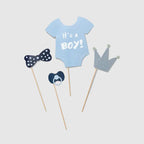 Baby blue photo props with onesie bowtie pacifier and crown for baby shower from Parte Haus party supply store in Bethesda Maryland