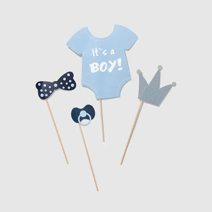 Baby blue photo props with onesie bowtie pacifier and crown for baby shower from Parte Haus party supply store in Bethesda Maryland