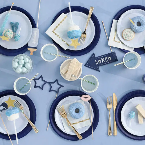 Baby blue photo props and tableware with treats for baby shower from Parte Haus party supply store in Bethesda MD