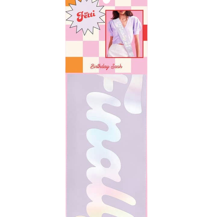 Lavender iridescent birthday sash with white script for birthday celebration from Parte Haus party supply store in Bethesda Maryland