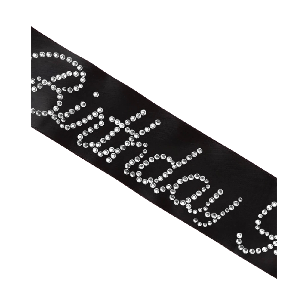 Black birthday sash with rhinestone lettering birthday celebration from Parte Haus party supply store in Bethesda MD.