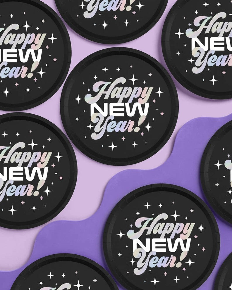 Black Happy New Year paper plates with stars for New Year’s Eve from Parte Haus party supply store in Bethesda MD