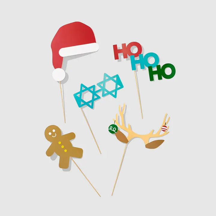 Multicolor holiday photo props with Santa hat Star of David antlers gingerbread man Christmas Hanukkah from Parte Haus party supply store in Bethesda MD