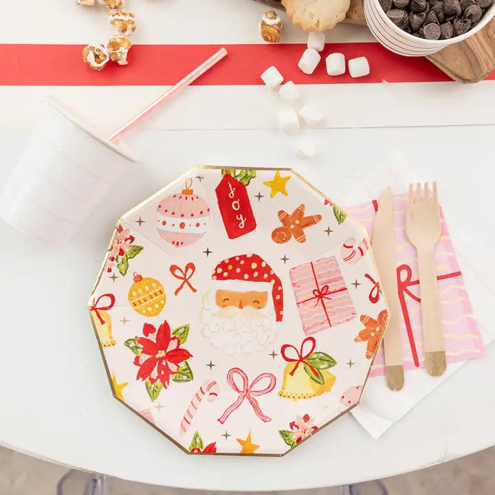 Colorful Christmas napkins with festive Santa and gift designs holiday theme from Parte Haus party supply store in Bethesda MD