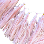 Pastel pink tassel garland hanging decor for birthday from Parte Haus party supply store in Bethesda Maryland