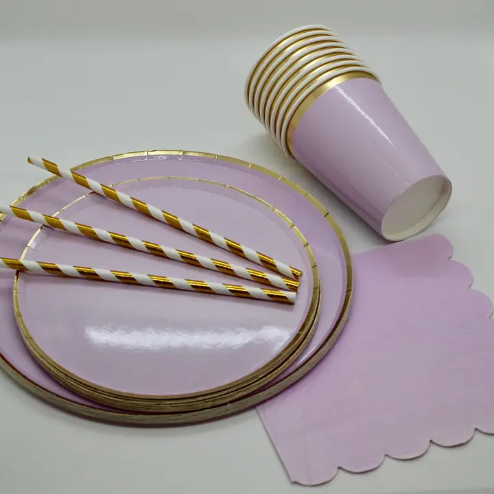 Light purple paper plates with gold trim cups straws and napkins for birthdays from Parte Haus party supply store in Bethesda MD