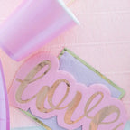 Pink love napkins with gold foil for romantic celebration from Parte Haus party supply store in Bethesda MD