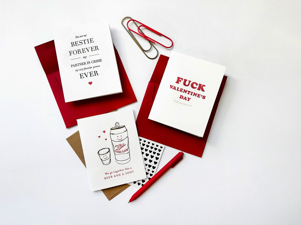 White and red friendship and love greeting cards with playful designs Valentine’s Day theme from Parte Haus party supply store in Bethesda MD