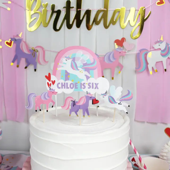 Colorful unicorn cupcake toppers and wrappers for kids birthday from Parte Haus party supply store in Bethesda Maryland
