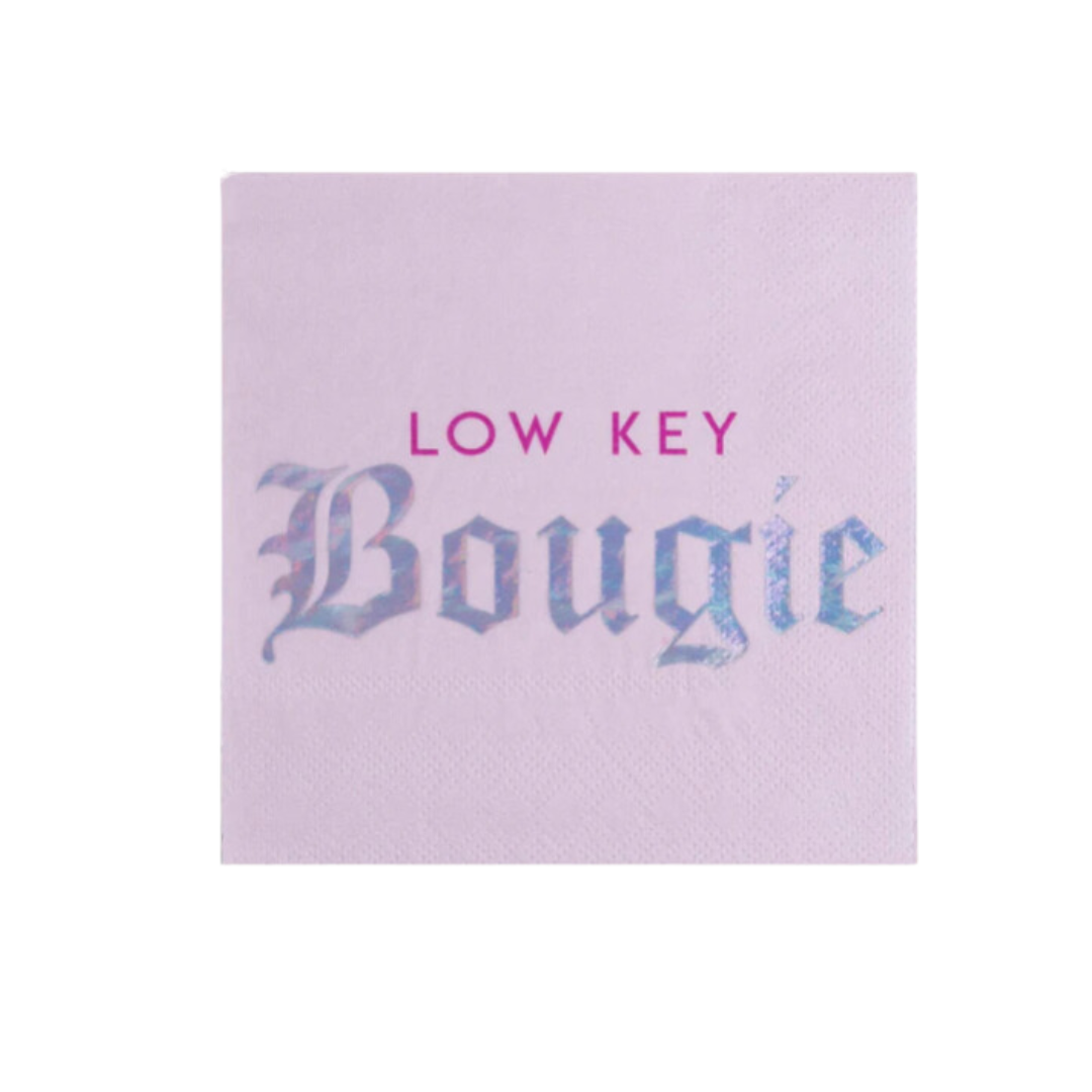 Pink cocktail napkin with low key bougie holographic text for celebration from Parte Haus party supply store in Bethesda MD