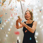 Gold confetti cannon with colorful confetti for Christmas or New Year from Parte Haus party supply store in Bethesda MD
