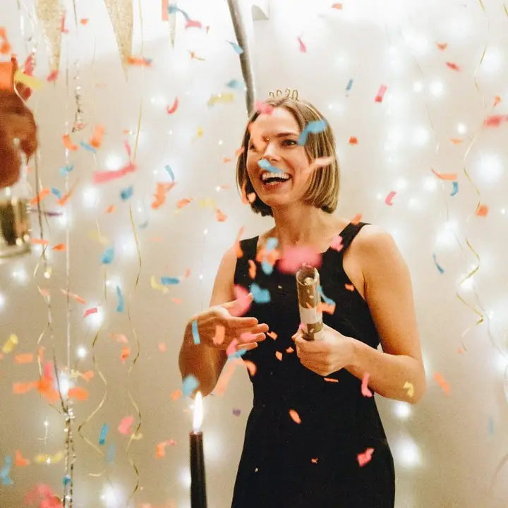 Luxe gold confetti cannon with colorful confetti for New Year from Parte Haus party supply store in Bethesda MD