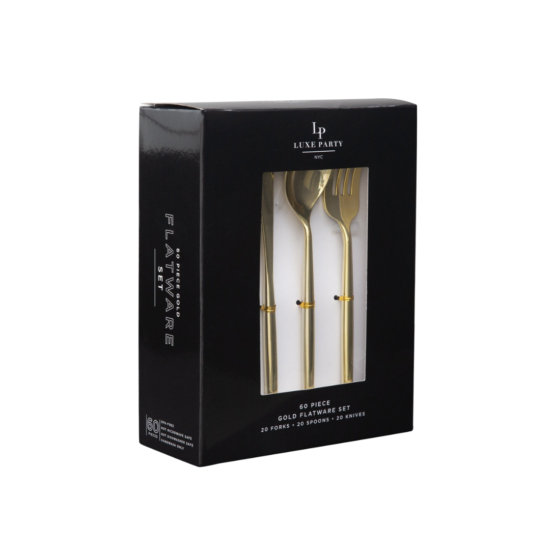 Gold flatware set with forks spoons and knives in a black box elegant dining from Parte Haus party supply store in Bethesda MD