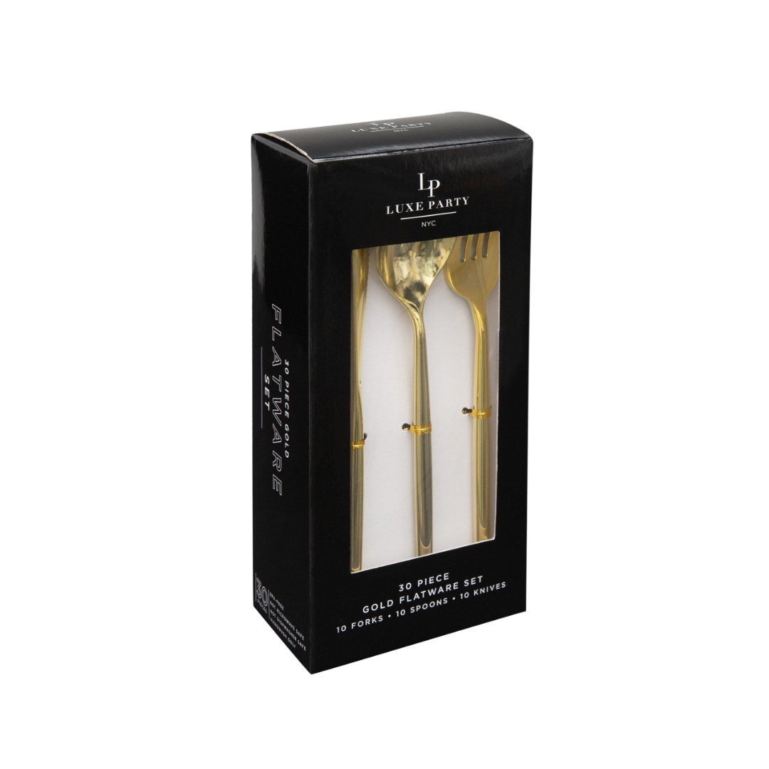 Gold flatware set in black box elegant forks knives and spoons for celebration from Parte Haus party supply store in Bethesda MD