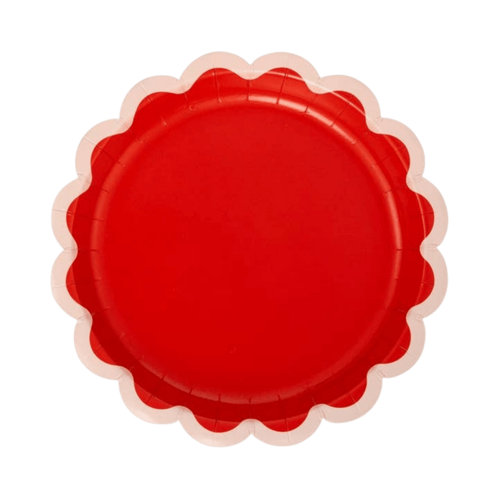 Red scalloped paper plate with white edge for birthday celebration from Parte Haus party supply store in Bethesda MD.