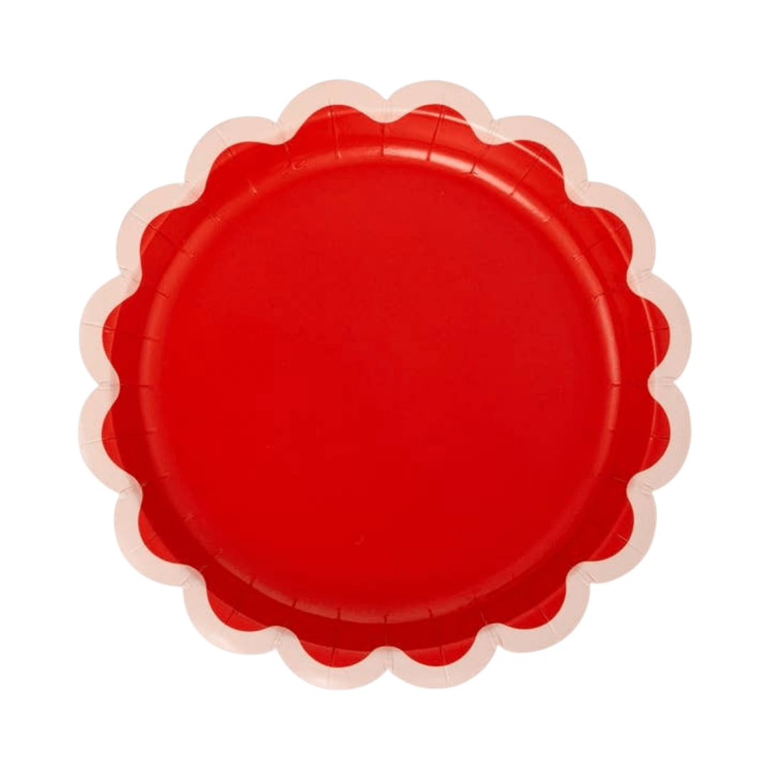 Red scalloped paper plate with white edge for birthday celebration from Parte Haus party supply store in Bethesda MD.