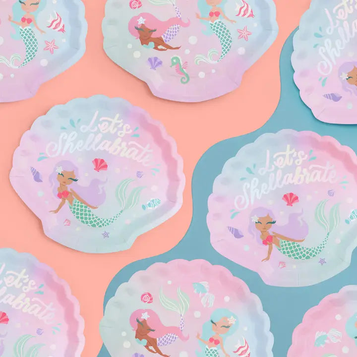 Pastel mermaid shell paper plates with Let's Shellabrate text birthday theme from Parte Haus party supply store in Bethesda Maryland