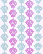 Purple and teal shell curtain with glittery mermaid theme from Parte Haus party supply store in Bethesda MD