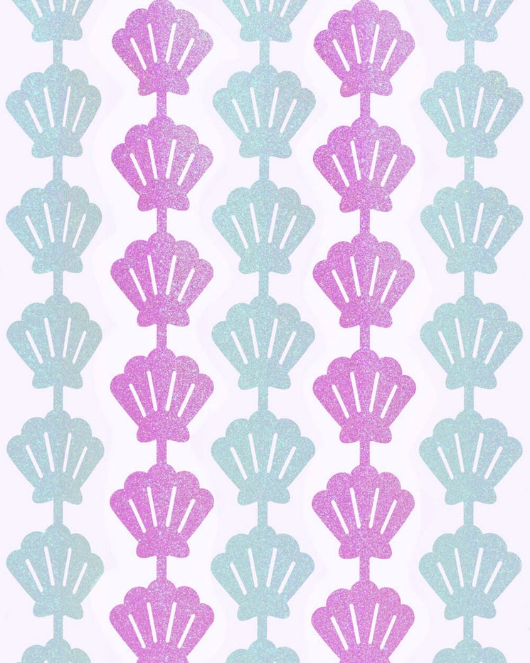 Purple and teal shell curtain with glittery mermaid theme from Parte Haus party supply store in Bethesda MD