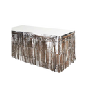 Silver metallic fringe table skirt with shiny streamers for celebrations from Parte Haus party supply store in Bethesda MD
