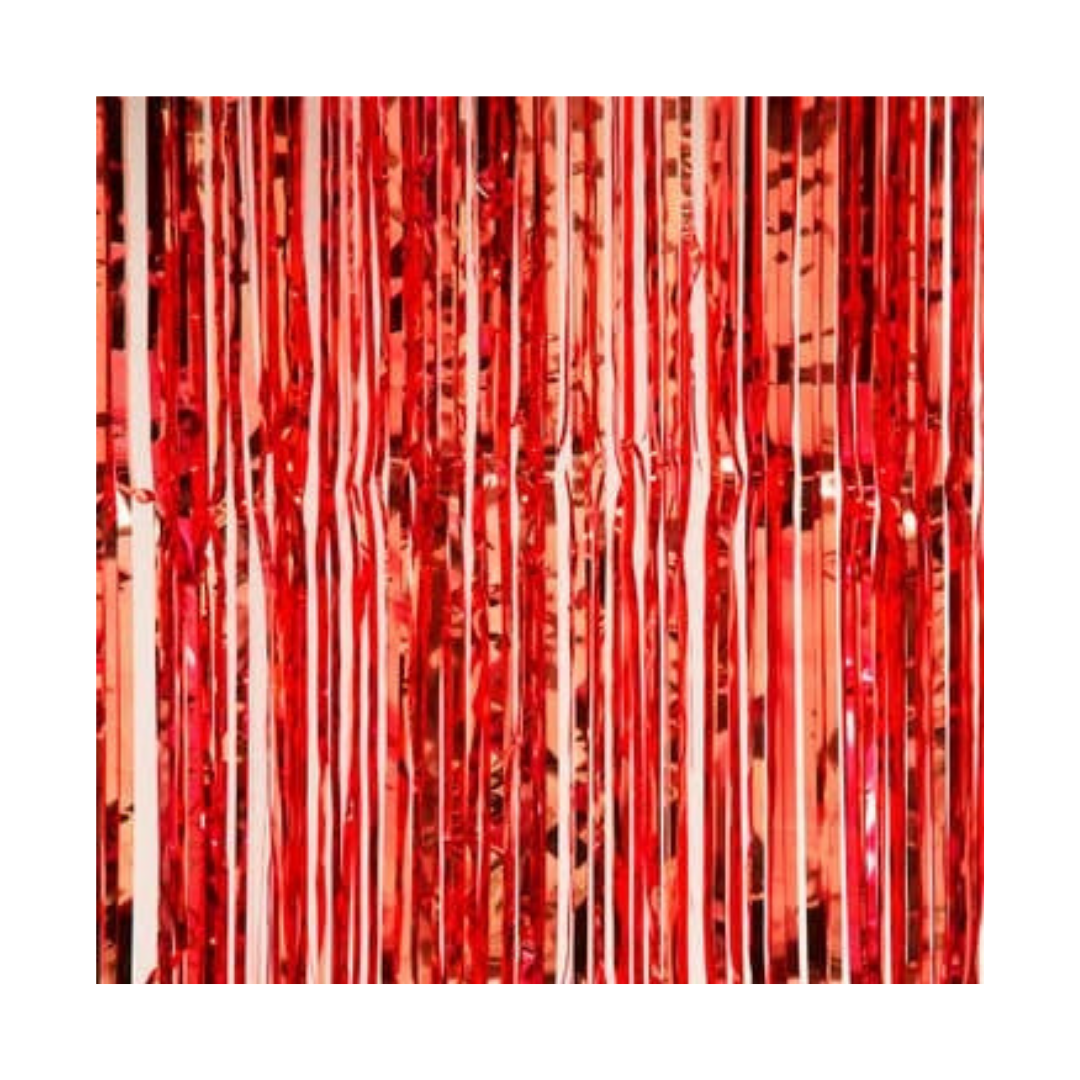 Red metallic backdrop curtain with shiny fringe for celebration decor from Parte Haus party supply store in Bethesda MD