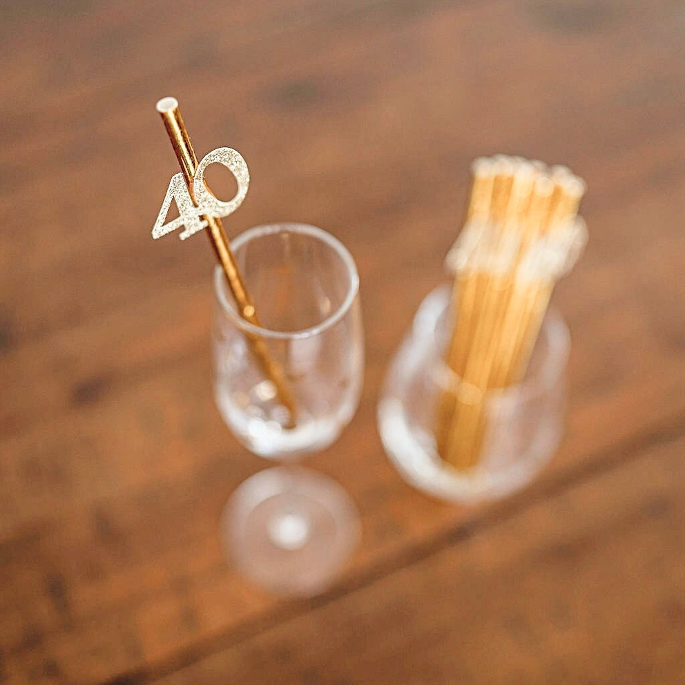 Metallic gold straw with glitter 40 topper for 40th birthday celebration from Parte Haus party supply store in Bethesda Maryland